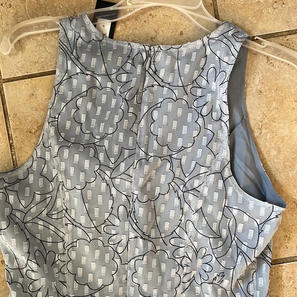 Light blue long dress with silver rectangular detail and black line design - Picture 4 of 5